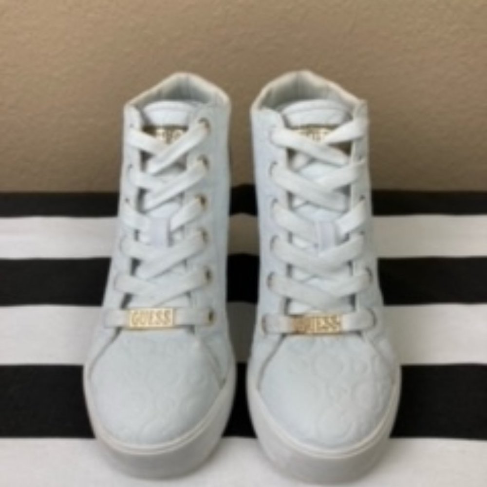 White heeled tennis shoes